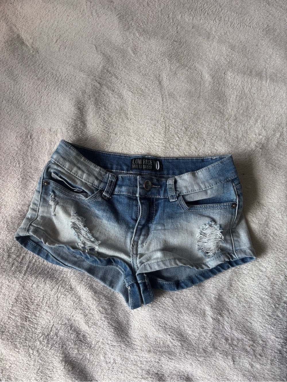 Low Rise Distressed Light Blue Denim Shorts - 0